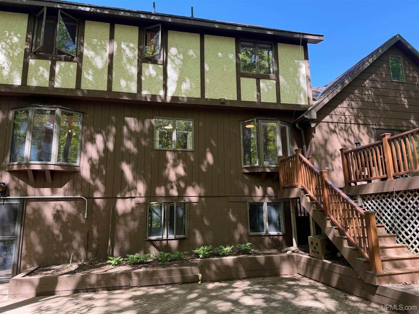 Nestled in one of Marquette's most desirable neighborhoods, this - photo 38
