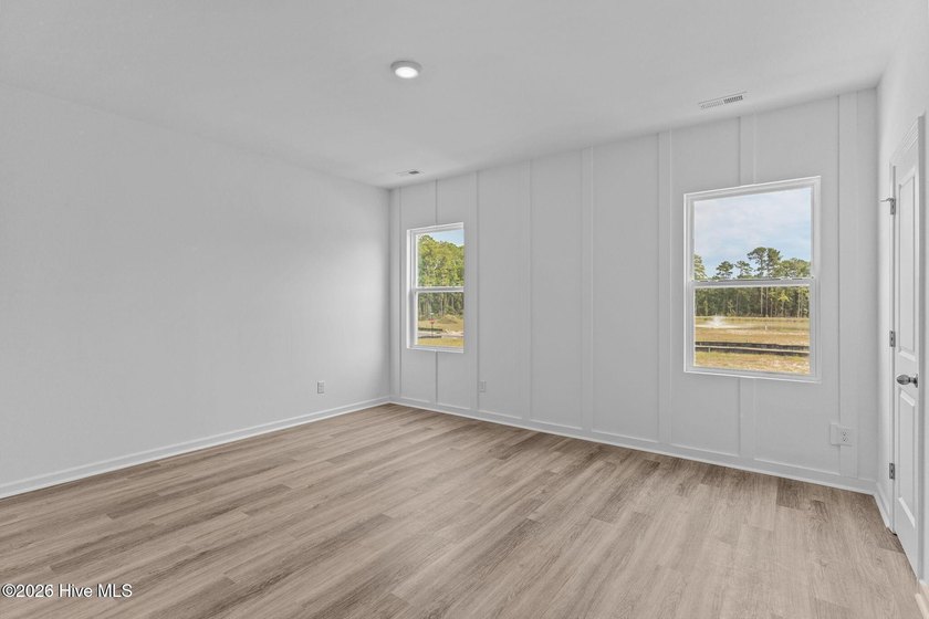 MOVE IN READY! Experience effortless, low-maintenance living in - photo 22
