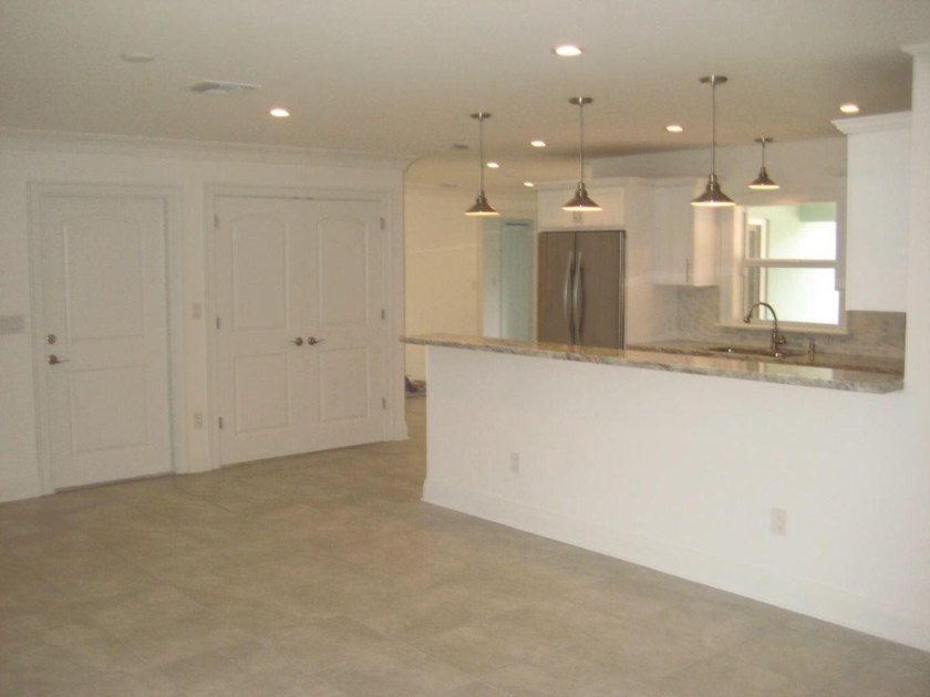 Welcome to this single-story residence in Boca Madera, located - photo 12