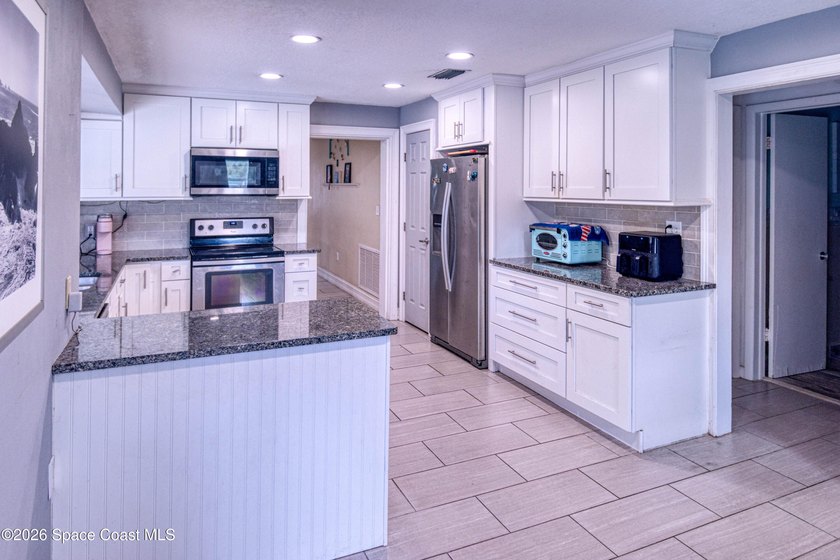 Discover the Florida lifestyle you've been dreaming of! Located - photo 12