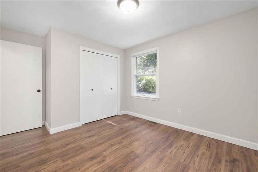 Expandable 2/3 Bedroom Raised Ranch home in Pettaquamscutt Lake - photo 18