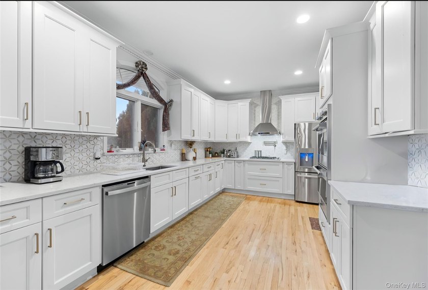 WATERFRONT Luxury Living in highly desired West Islip at an - photo 9