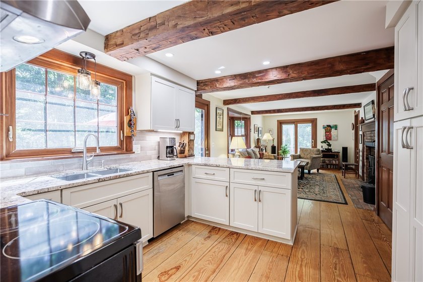 Welcome to 87 Loch Revan Heights. This four bedroom, one and a - photo 10