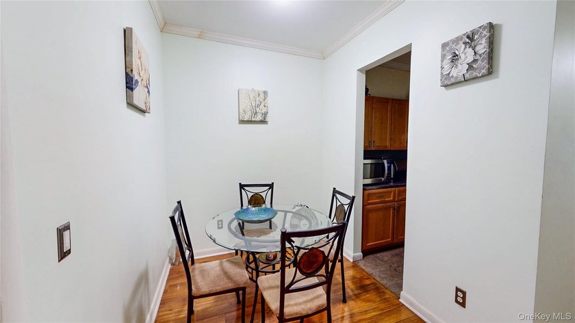 This beautifully maintained legal 3-family semi-detached home - photo 15