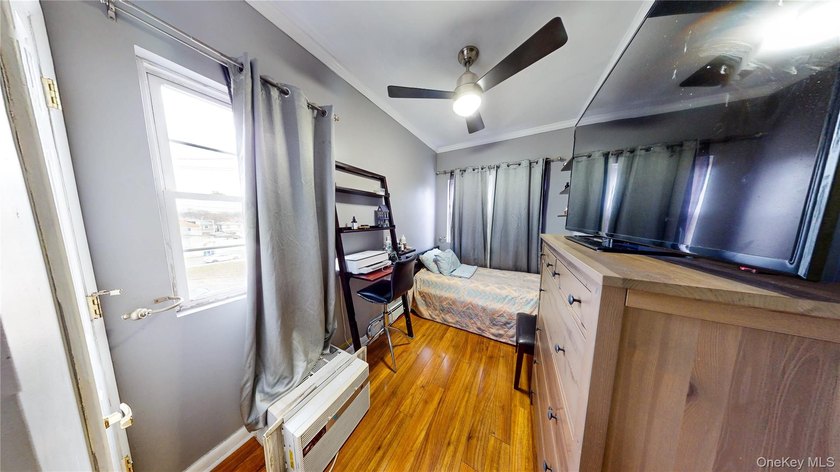 This beautifully maintained legal 3-family semi-detached home - photo 17