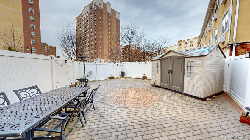 This beautifully maintained legal 3-family semi-detached home - photo 23