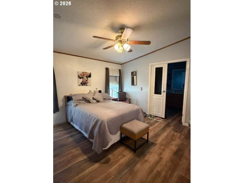 Experience tranquility at Giadanj Lake Estates with this updated - photo 14