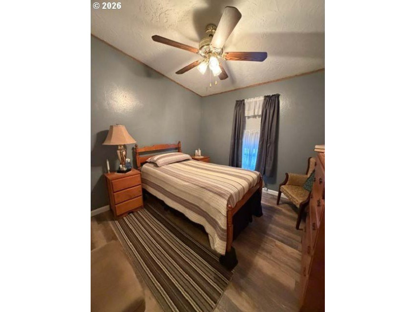 Experience tranquility at Giadanj Lake Estates with this updated - photo 17