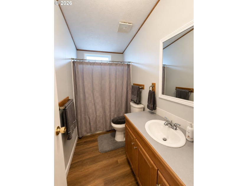 Experience tranquility at Giadanj Lake Estates with this updated - photo 18