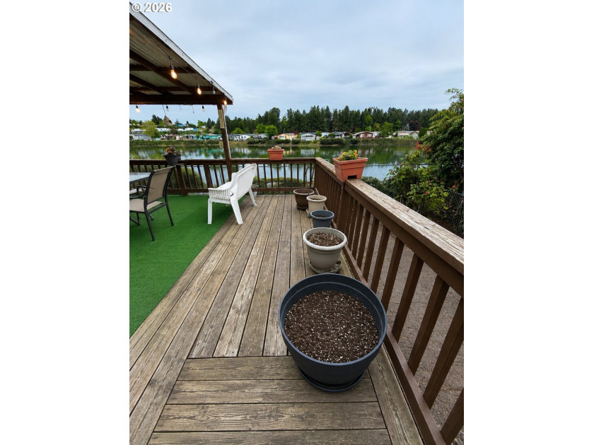Experience tranquility at Giadanj Lake Estates with this updated - photo 19