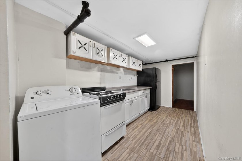 Well-maintained 3-story, 2-family brick home featuring a - photo 21