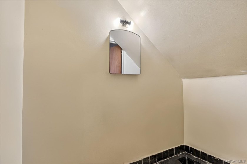 Well-maintained 3-story, 2-family brick home featuring a - photo 30