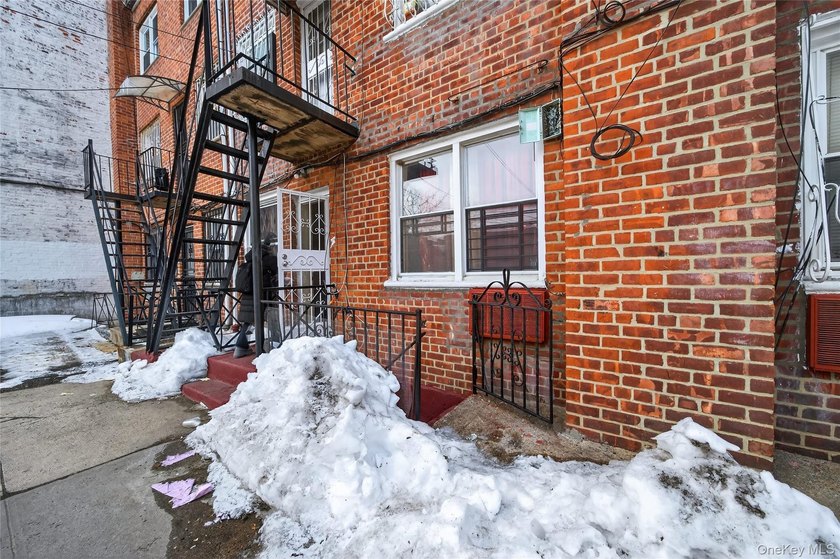 Well-maintained 3-story, 2-family brick home featuring a - photo 39