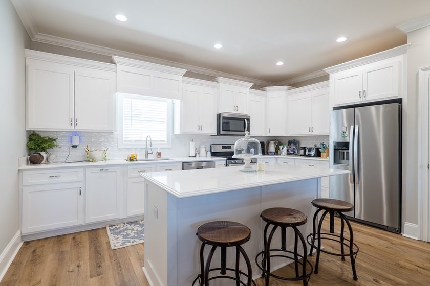 BEAUTIFUL PRACTICALLY NEW HOME (Built in 2023) on the CANAL with - photo 11