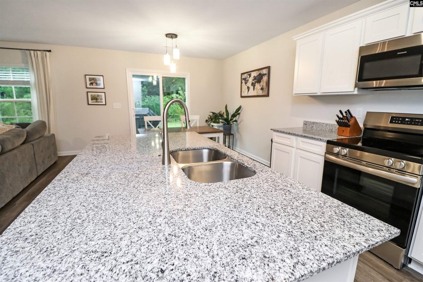 Welcome to Wimbee! This inviting 4-bedroom, 2.5-bath home sits - photo 12