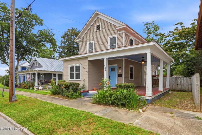 Step into the timeless character of this beautifully maintained - photo 3