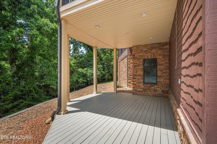 Experience luxury lakefront living in this exceptional 5-bedroom - photo 11