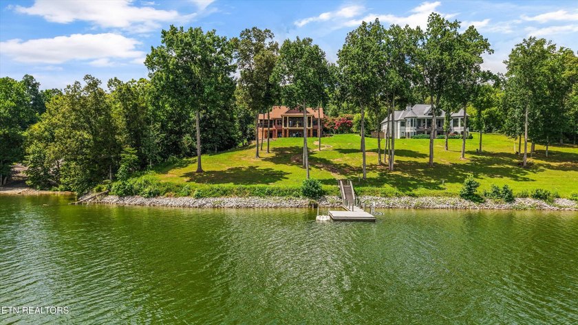 Experience luxury lakefront living in this exceptional 5-bedroom - photo 16