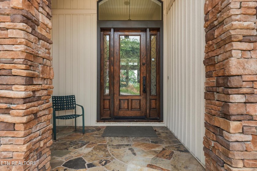 Experience luxury lakefront living in this exceptional 5-bedroom - photo 21