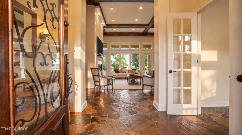 Experience luxury lakefront living in this exceptional 5-bedroom - photo 22