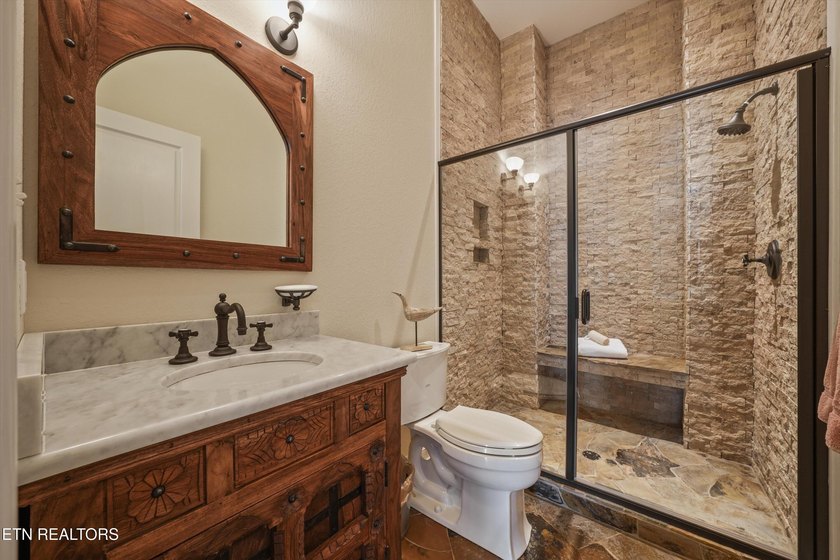 Experience luxury lakefront living in this exceptional 5-bedroom - photo 25