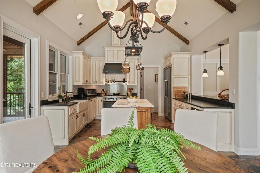 Experience luxury lakefront living in this exceptional 5-bedroom - photo 36