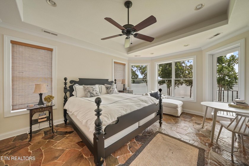 Experience luxury lakefront living in this exceptional 5-bedroom - photo 39