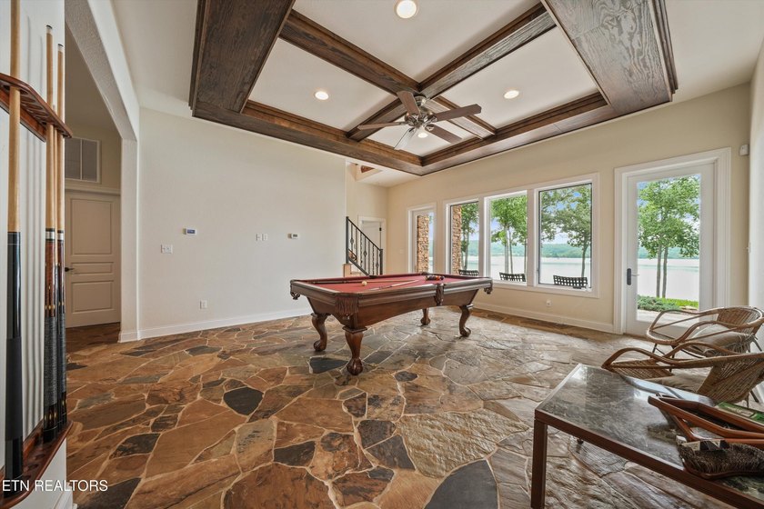 Experience luxury lakefront living in this exceptional 5-bedroom - photo 45