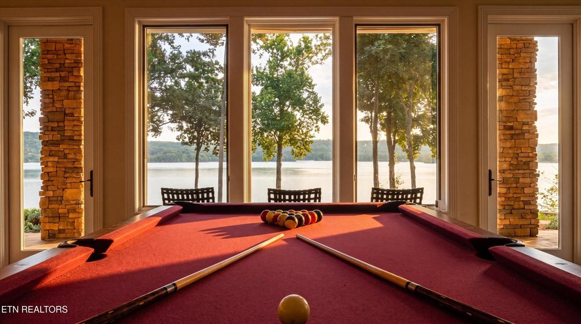 Experience luxury lakefront living in this exceptional 5-bedroom - photo 47