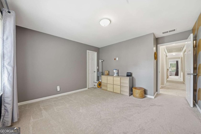 Nestled in the highly sought-after Waters Edge, this traditional - photo 24