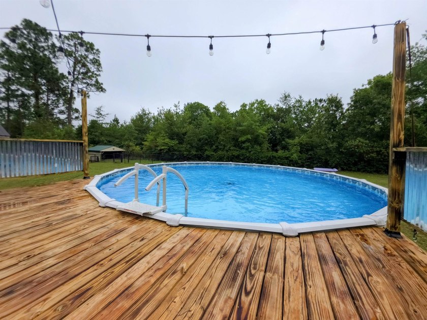 Enjoy the peace and privacy of country living in this - photo 33