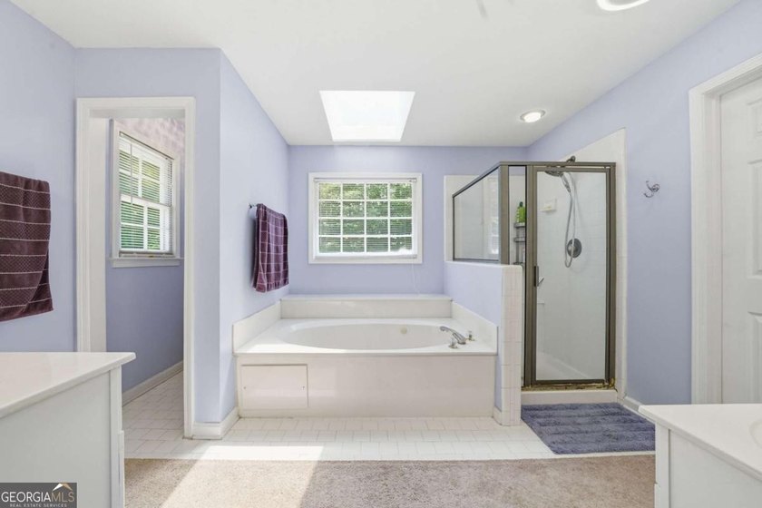 Nestled in the highly sought-after Waters Edge, this traditional - photo 33