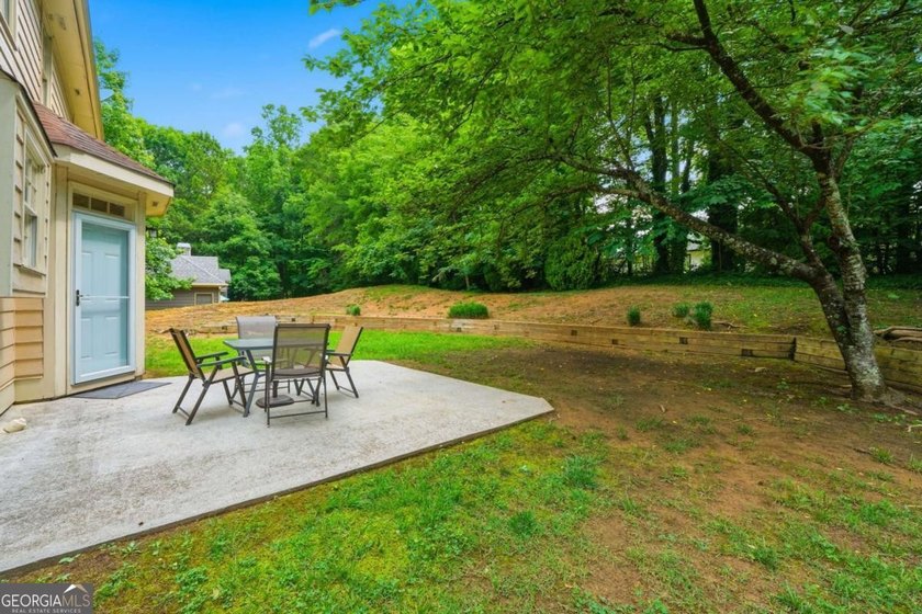 Nestled in the highly sought-after Waters Edge, this traditional - photo 38