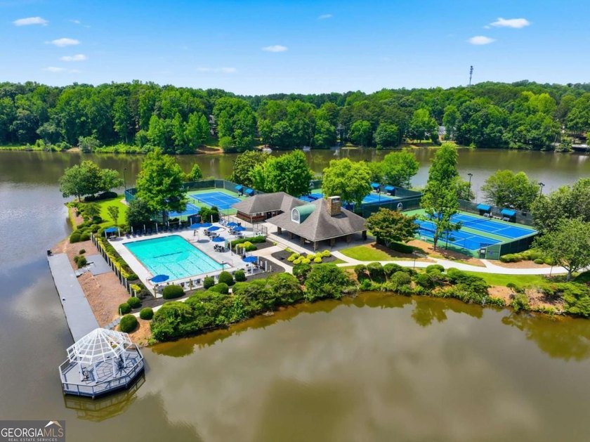 Nestled in the highly sought-after Waters Edge, this traditional - photo 44