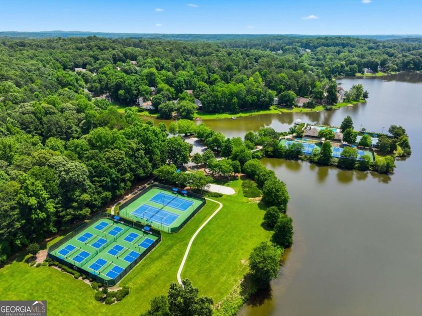 Nestled in the highly sought-after Waters Edge, this traditional - photo 45