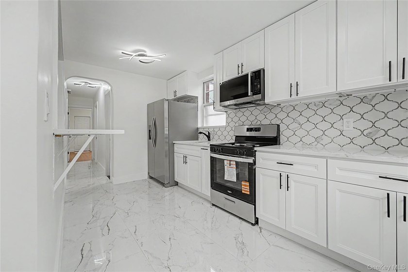 Experience modern living in this fully renovated Brooklyn home - photo 2