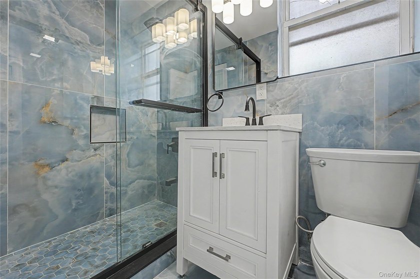Experience modern living in this fully renovated Brooklyn home - photo 8