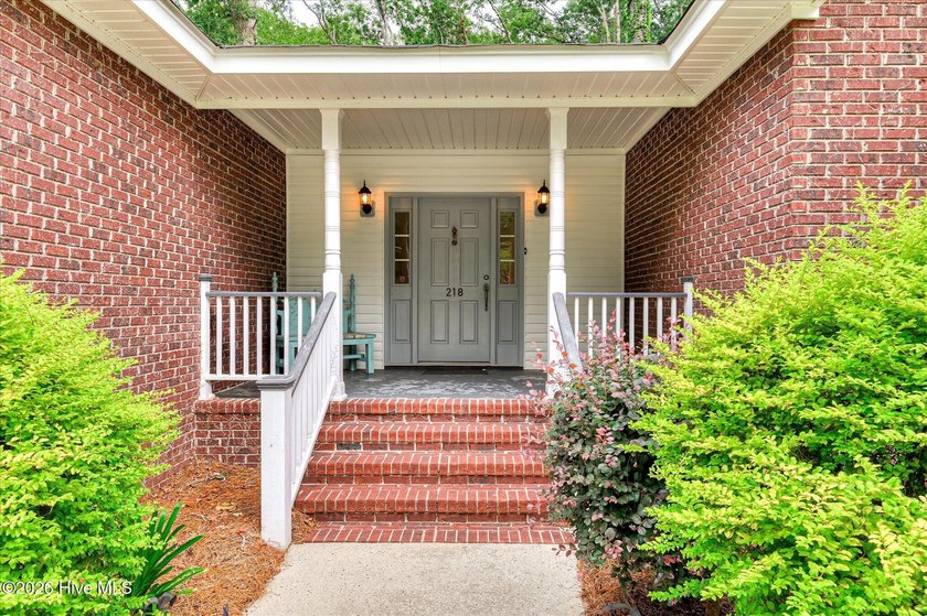 **This stunning brick home truly has it all.** Nestled in one of - photo 5