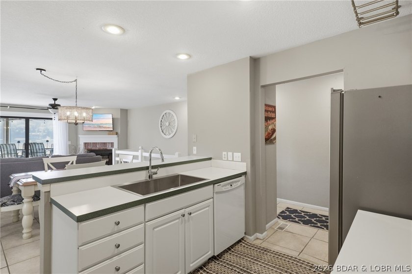 Welcome to your two-level lakefront retreat in the heart of the - photo 12