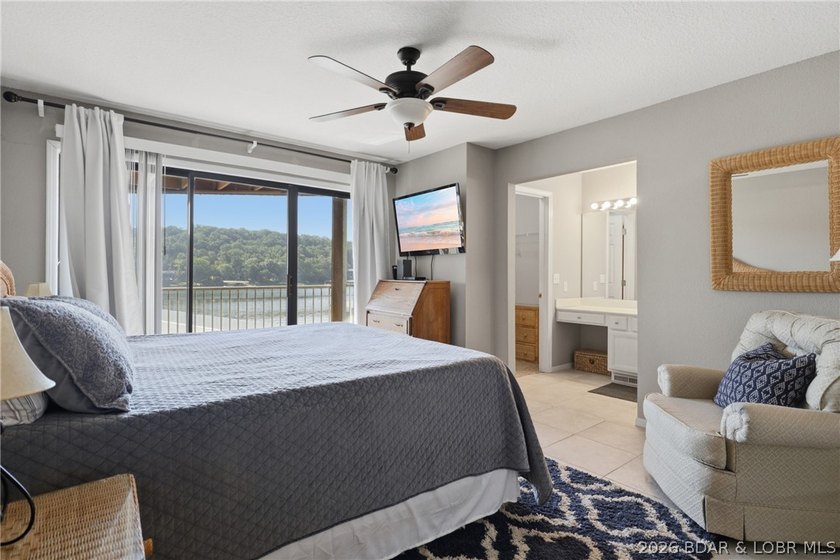 Welcome to your two-level lakefront retreat in the heart of the - photo 14