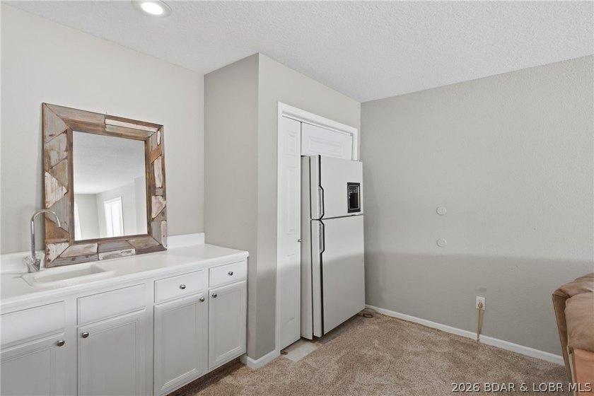 Welcome to your two-level lakefront retreat in the heart of the - photo 21
