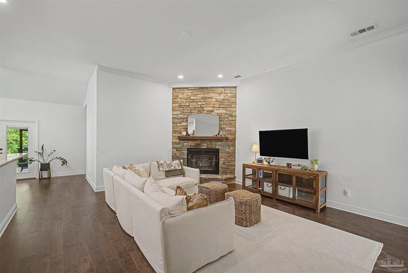 Discover this beautifully maintained home in Nature Trail. Backs - photo 10