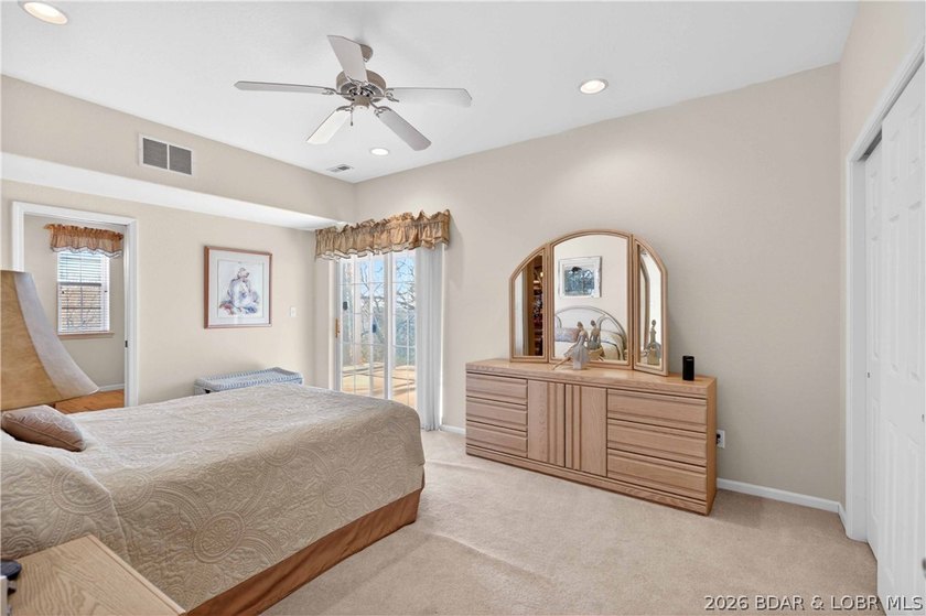 6835 Saint Tropez Circle in Osage Beach offers inviting Lake of - photo 13
