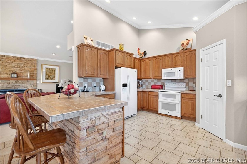 6835 Saint Tropez Circle in Osage Beach offers inviting Lake of - photo 31