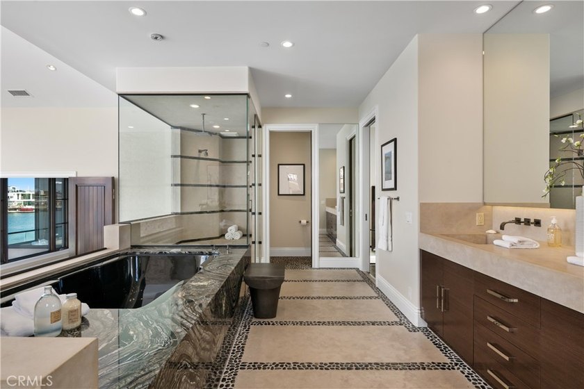 Situated upon the prestigious enclave of Gilbert Island within - photo 31