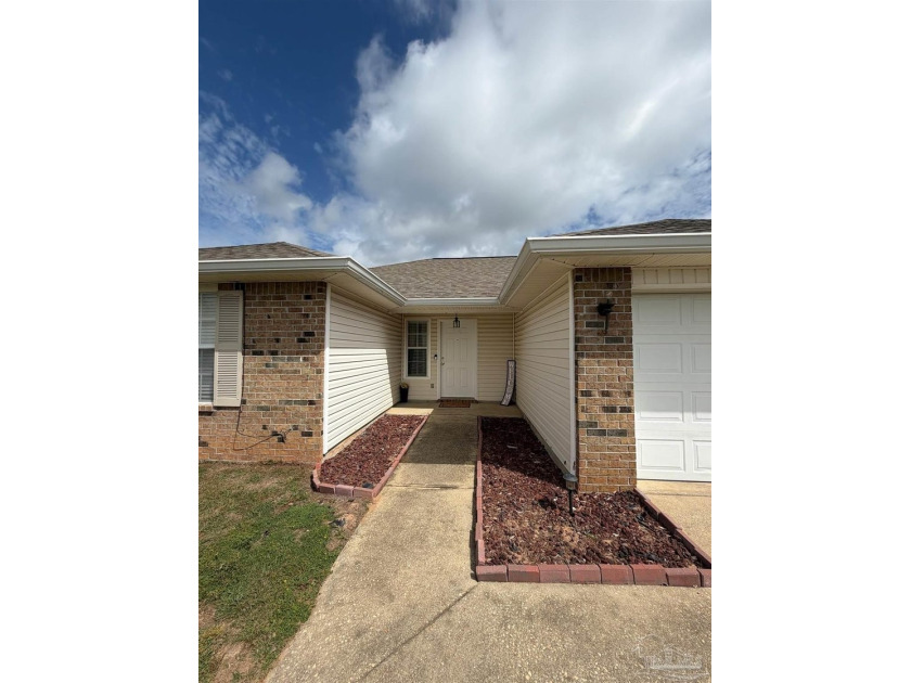 Charming **3-bedroom, 2-bath home located in the desirable - photo 3