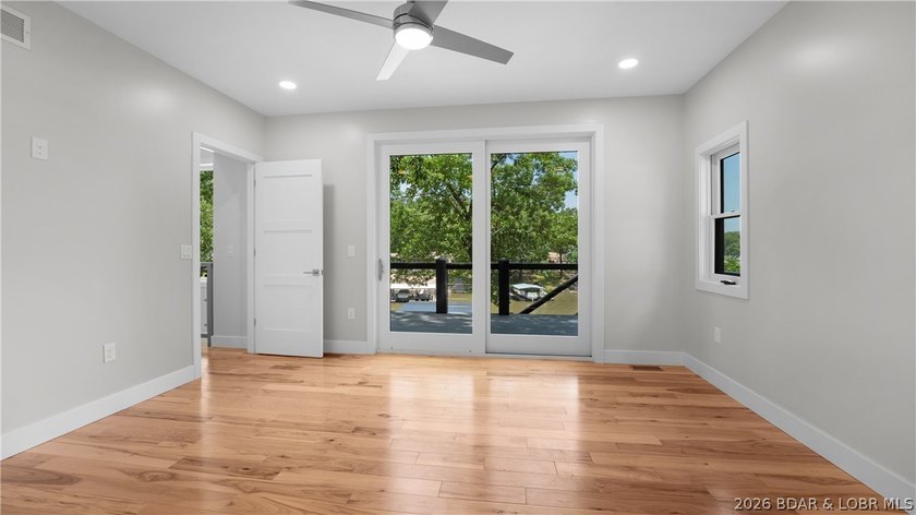 Experience Open Space Luxury lakefront living in this custom - photo 12