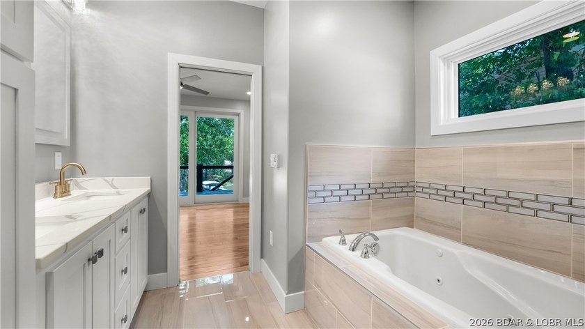 Experience Open Space Luxury lakefront living in this custom - photo 17
