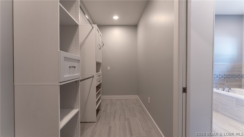 Experience Open Space Luxury lakefront living in this custom - photo 18