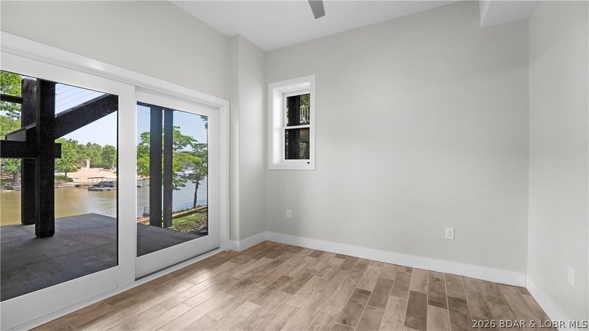 Experience Open Space Luxury lakefront living in this custom - photo 25